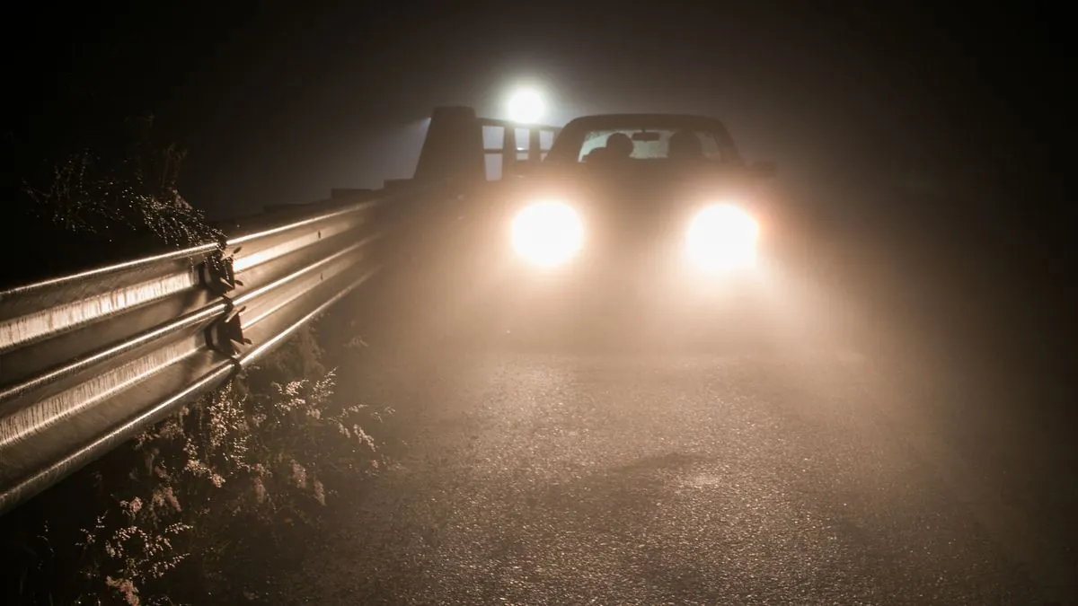 A commuter car in London traffic with a tyre problem