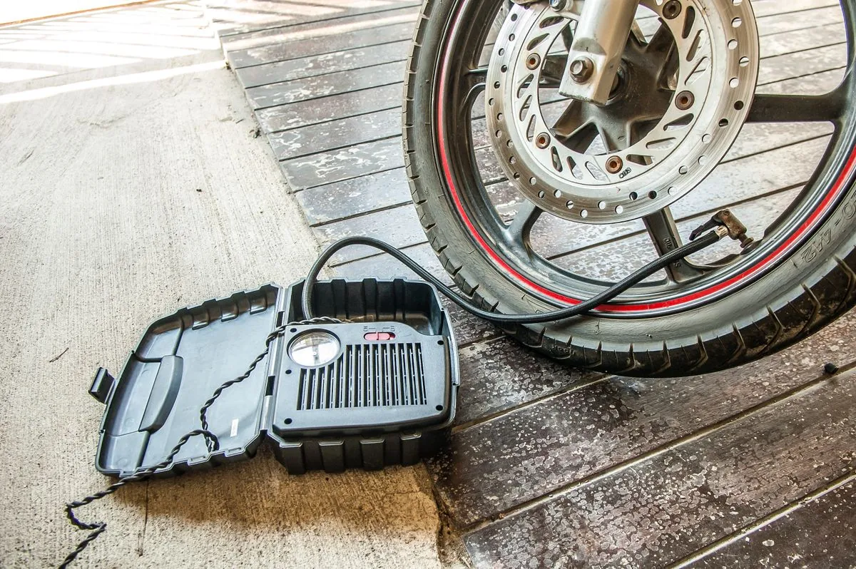 A tyre being inflated, comparing nitrogen and normal compressed air